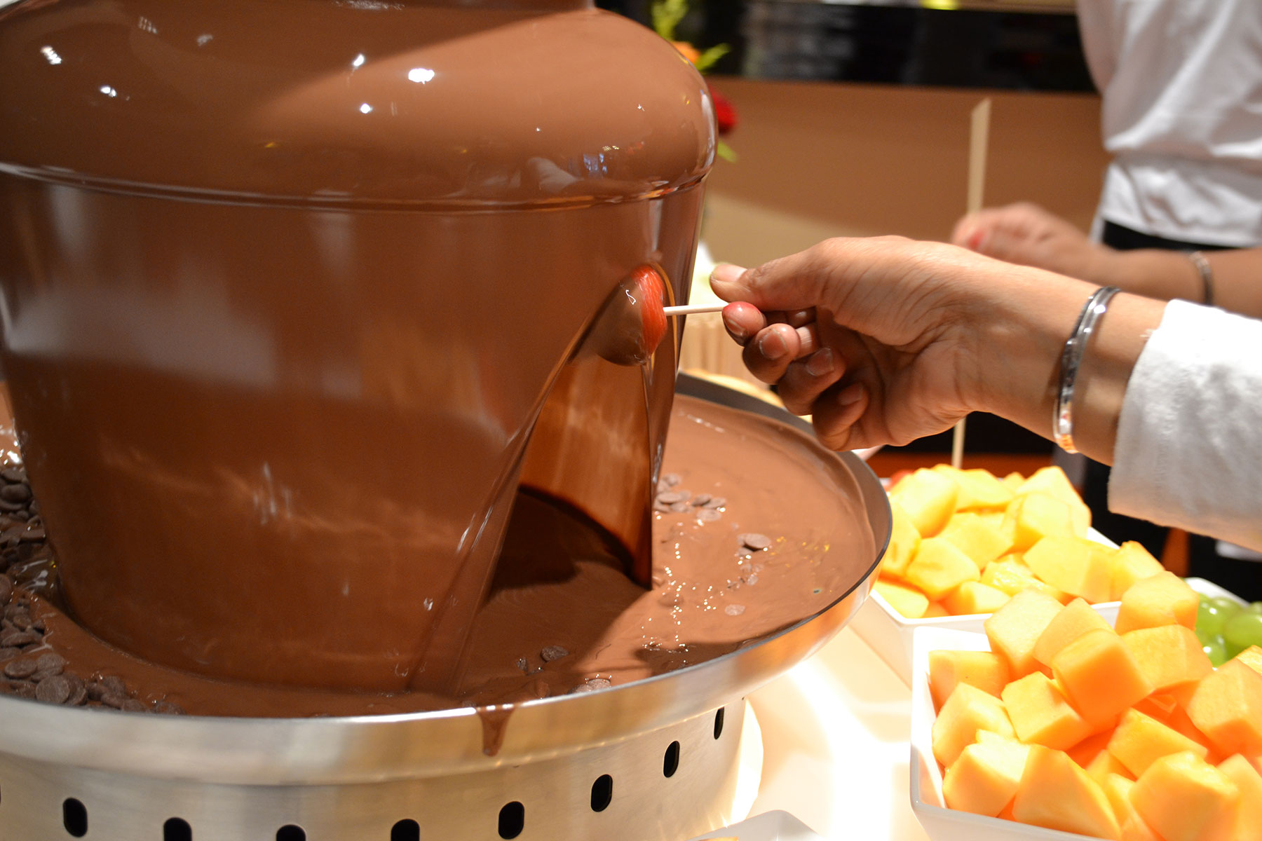 dipping-strawberry-in-chocolate-fountain
